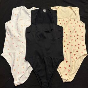 NWOT OQQ One Pieces Set